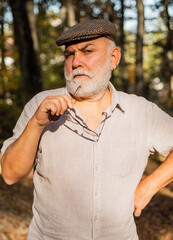 Obraz premium What if. Thinking man. Meaning of life. Elderly people care. Nursing home. True values. Pensioner relax autumn nature. Natural environment. Fresh air. Idyllic moment. Grandpa vintage outfit in nature