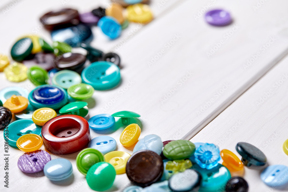 Aufkleber Background and texture of multicolored antique buttons