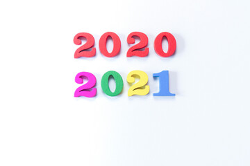 New year concept with wooden 2020 and 2021 numbers