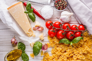 concept of traditional italian pasta with tomatoes and basil