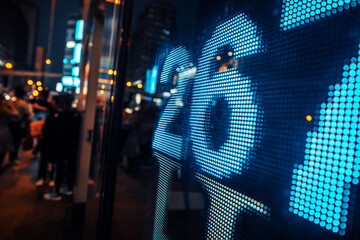 Financial stock exchange market display screen board on the street, selective focus