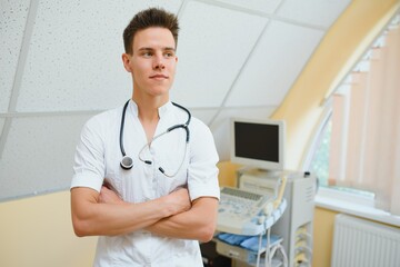 doctor using a modern ultrasound transducer in the clinic