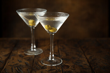 Classic martini cocktail with olives
