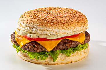 Traditional Brazilian hamburger, with bread, melted cheese, lettuce, tomato, mayonnaise