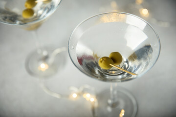 Classic martini cocktail with olives
