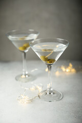 Classic martini cocktail with olives
