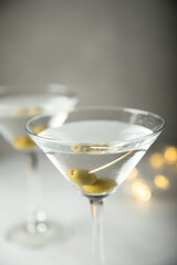 Classic martini cocktail with olives
