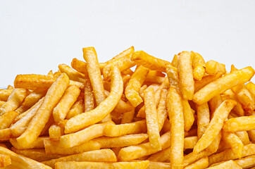 Portion of french fries served on plate on white background