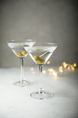 Classic martini cocktail with olives