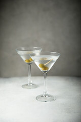 Classic martini cocktail with olives