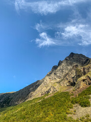 Fields in the mountains, natural colors, mountains background