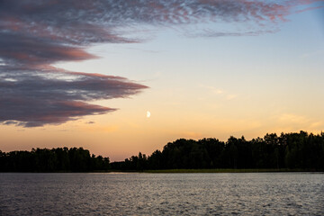 morning haze rises over the lake at sunrise