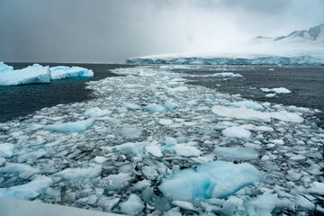 Antarctica, Antarctic Peninsula. In the Gerlach Street. The Fournier Bay covert with floating shelf ice
