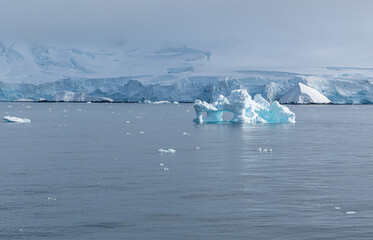 Antarctica, Antarctic Peninsula. In the Gerlach Street. Ice covered Fournier Bay  and floating Icebergs