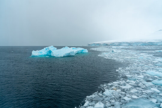 Antarctica, Antarctic Peninsula. In the Gerlach Street. The Fournier Bay covert with  floating shelf ice