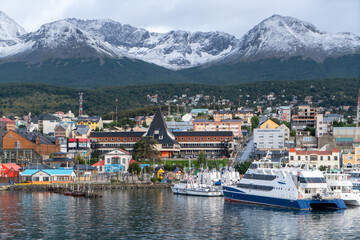Argentina, Patagonia, in the city of Ushuaia. View on the Harbour from the sea side. - obrazy, fototapety, plakaty