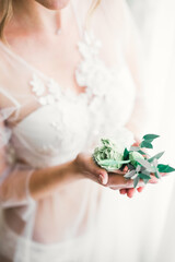 Bride holding beautiful bouquet with flowers