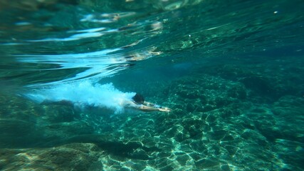 Fototapeta na wymiar young man snorkelling in costa brava
