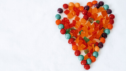 heart made of multicolored sweets