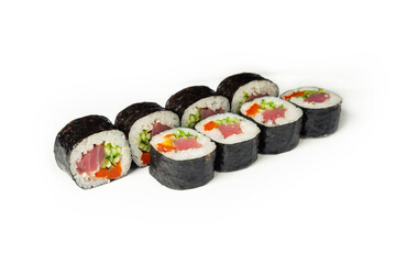 Sushi roll with tuna and vegetables on a white plate, classic Japanese sushi. Traditional Japanese food with maki. Delicious pieces of sushi. For the restaurant menu. copyspace