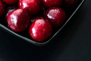 red cherries in a bowl