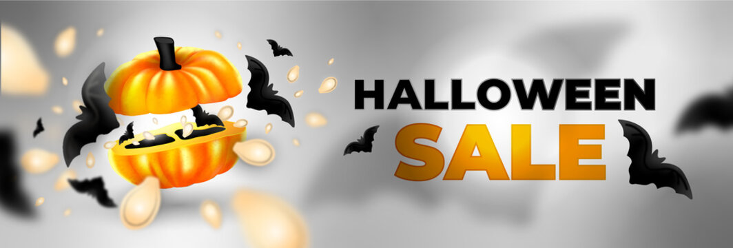 Halloween sale  with a cut pumpkin and splesh of seeds on a grey background