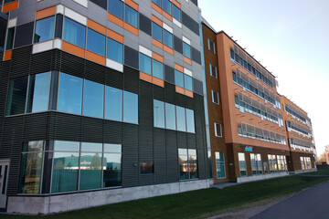 Obraz premium Low angle view of high multistorey office building.