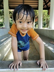 A little boy in the pool