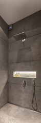 Concrete wall tiles in shower, panorama