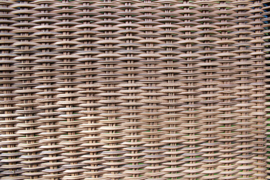 braided rattan texture of a chair backrest