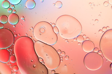 Colorful artistic of oil drop floating on the water. Abstract pastel bubble background.