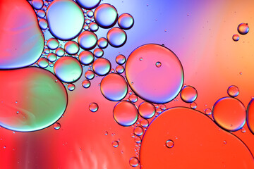 Colorful artistic of oil drop floating on the water. Abstract bubble background.
