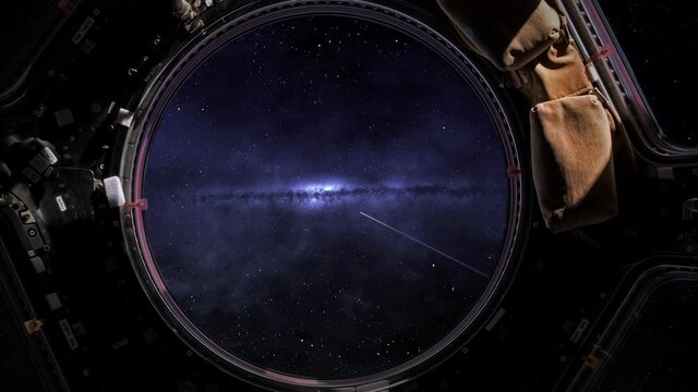 Comets in the milky way as viewed through a space shuttle window.