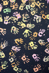 Colorful hand painting on black background.
