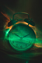 vintage alarm clock in shiny futuristic dust