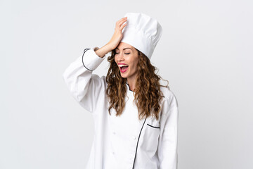 Young chef woman isolated on white background has realized something and intending the solution