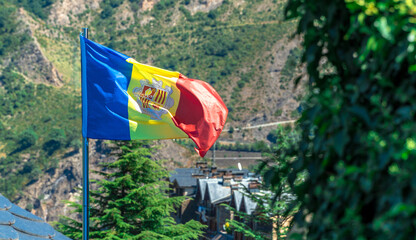 Andorran flag waving in a countryside scenery - obrazy, fototapety, plakaty