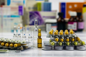 A set of medicines for treatment. Pharmaceutical drug, medicine in a container for treatment. Selective focus