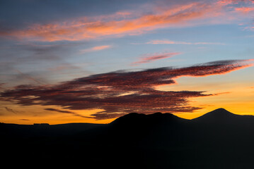 Sunset in the mountains. Beauty of blue hour. Gorgeous purple sunset over Wicklow Mountains viewed from Bray Head, County Wicklow, Ireland