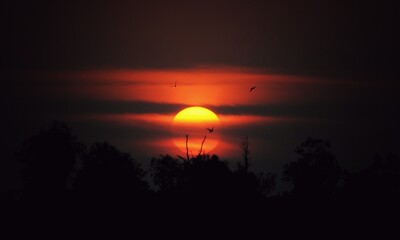 sunset over the lake at remote village