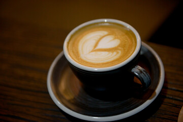 The cup of coffee latte with art
