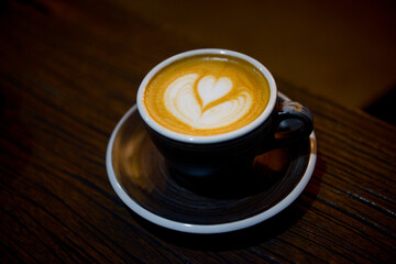 The cup of coffee latte with art