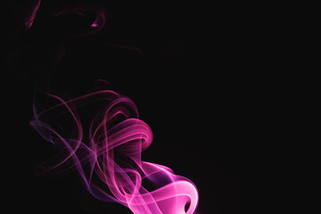 Naklejka na ściany i meble Purple smoke on a black background. Colored smoke. Incense stick smoke illuminated by purple light.