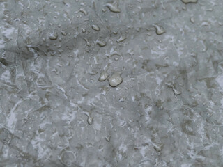 texture large raindrops on the fabric of the tent