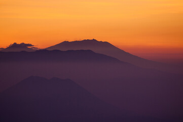 Fototapeta na wymiar Sunrise at mountain near Mount Bromo volcanoes in Bromo Tengger Semeru National Park, East Java, Indonesia
