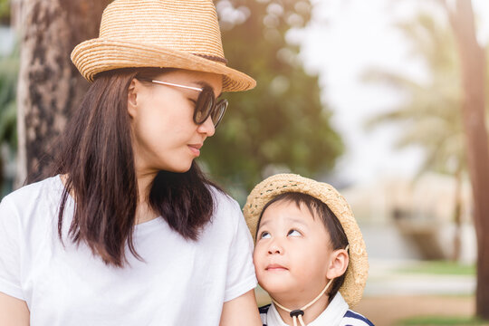 Happy Loving Family.Asian Mother And Baby Boy Child Talking In Playground Outdoor At The Park.Cute Child With Mother Encourage And Play.Child Development,Mother And Son Traveller, Healthcare, People.