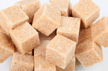 Cane sugar cubes. Macro. Texture