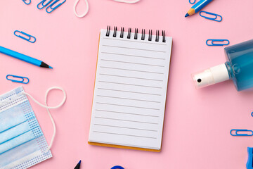 School stationery items and medical face mask