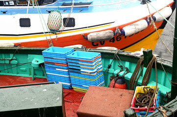 Fototapeta na wymiar Fishing vessel, trawler in a fishing harbour