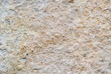 beige textured decorative stucco background with place for text